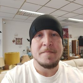 Chris – Volunteer Store Assistant Chris - Volunteer Store Assistant